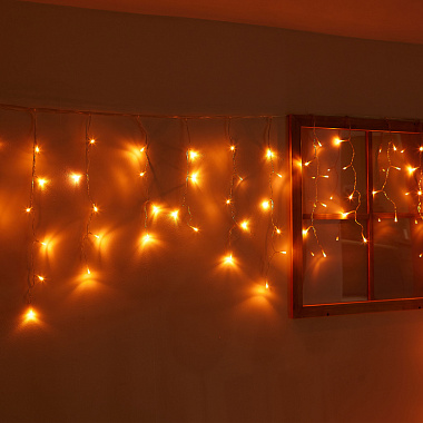 Бахрома светодиодная с эффектом мерцания, 12м. Соединяемая. 195 светодиодов. Янтарный свет. Провод прозрачный. ТМ Uniel